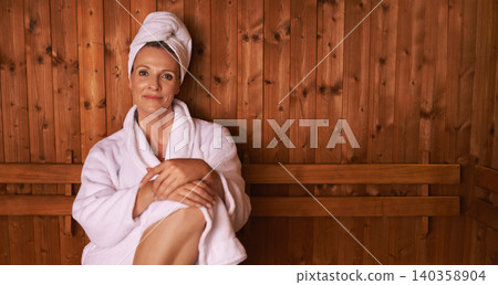 Woman, portrait and relax in spa sauna or vacation wellness as beauty treatment for resting, detox or holiday. Female person, face and bathrobe or peace at Bali resort or leisure, stress free or calm Woman, portrait and relax in spa sauna or vacation wellness as beauty treatment for resting, detox or holiday. Female person, face and bathrobe or peace at Bali resort or leisure, stress free or calm 140358904