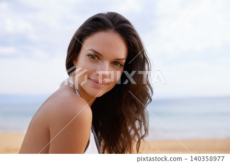 Beach, smile and portrait of woman in nature on tropical vacation, adventure or holiday. Happy, travel and young female person with positive attitude by ocean on summer weekend trip by island. Beach, smile and portrait of woman in nature on tropical vacation, adventure or holiday. Happy, travel and young female person with positive attitude by ocean on summer weekend trip by island. 140358977