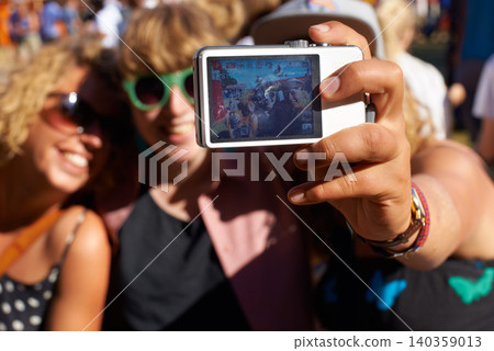 Friends, selfie and camera at music festival in nature, excited and together in forest for social. People, profile picture and celebration in summer on holiday, relax and care at concert in woods Friends, selfie and camera at music festival in nature, excited and together in forest for social. People, profile picture and celebration in summer on holiday, relax and care at concert in woods 140359013