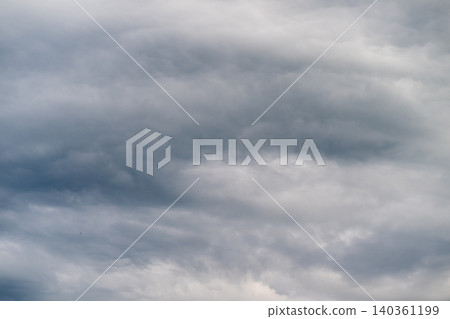 Soft overcast sky with layered clouds, muted gray tones and subtle texture, gentle gradients create peaceful mood for backgrounds, web banners, nature and weather concepts Soft overcast sky with layered clouds, muted gray tones and subtle texture, gentle gradients create peaceful mood for backgrounds, web banners, nature and weather concepts 140361199