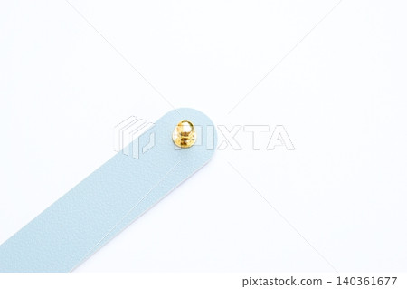 light blue leather strap isolated on white background light blue leather strap isolated on white background 140361677