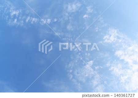 beautiful blue sky and white fluffy group of clouds with sunrise in the morning, natural background beautiful blue sky and white fluffy group of clouds with sunrise in the morning, natural background 140361727