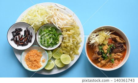 rice vermicelli with northern thai curry sauce on blue background rice vermicelli with northern thai curry sauce on blue background 140361743