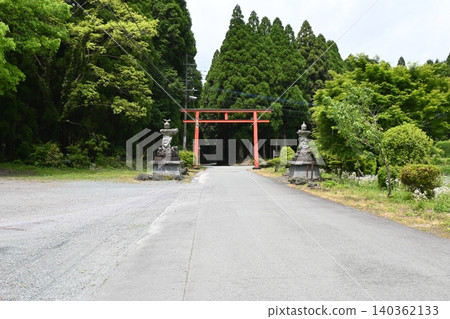 Akamizuhebiishi Shrine, a power spot for financial luck located in Aso City, Kumamoto Prefecture, surrounded by lush greenery. Akamizuhebiishi Shrine, a power spot for financial luck located in Aso City, Kumamoto Prefecture, surrounded by lush greenery. 140362133