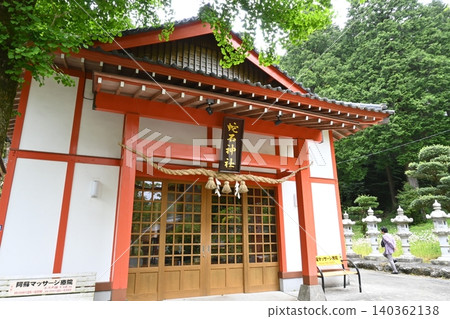 Akamizuhebiishi Shrine, a power spot for financial luck located in Aso City, Kumamoto Prefecture, surrounded by lush greenery. Akamizuhebiishi Shrine, a power spot for financial luck located in Aso City, Kumamoto Prefecture, surrounded by lush greenery. 140362138