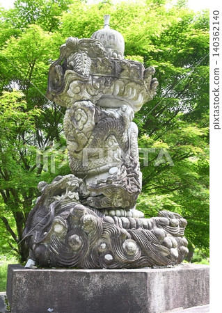 Akamizuhebiishi Shrine, a power spot for financial luck located in Aso City, Kumamoto Prefecture, surrounded by lush greenery. Akamizuhebiishi Shrine, a power spot for financial luck located in Aso City, Kumamoto Prefecture, surrounded by lush greenery. 140362140