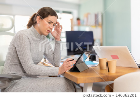 Female office worker sitting at desk. Tired woman accountant doing her job Female office worker sitting at desk. Tired woman accountant doing her job 140362201