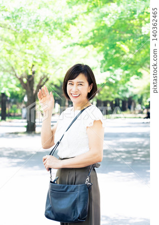 middle-aged women commuting to work middle-aged women commuting to work 140362465