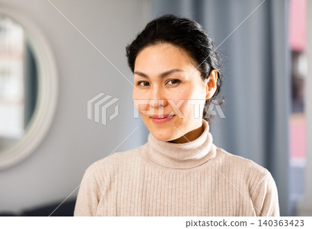 Portrait of Asian woman at home 140363423