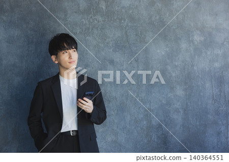 Men with smartphones Men with smartphones 140364551