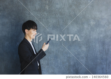 Men with smartphones Men with smartphones 140364560