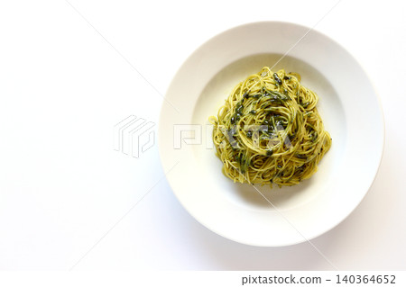 Genovese pasta viewed from directly above against a white background. Genovese pasta viewed from directly above against a white background. 140364652