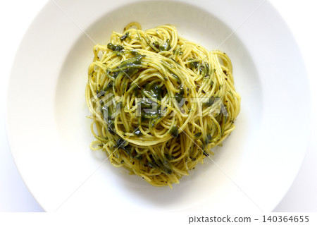 Genovese pasta viewed from directly above against a white background. Genovese pasta viewed from directly above against a white background. 140364655