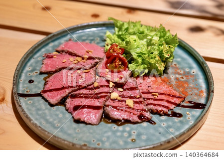 Cold Wagyu beef and wasabi greens 140364684