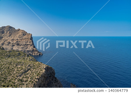 Cap de Formentor, Mallorca panoramic view of Mediterranean sea and rugged rocky coastline Cap de Formentor, Mallorca panoramic view of Mediterranean sea and rugged rocky coastline 140364779