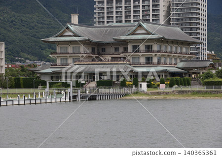 View of Lake Biwa Otsu Museum from a sightseeing boat. View of Lake Biwa Otsu Museum from a sightseeing boat. 140365361