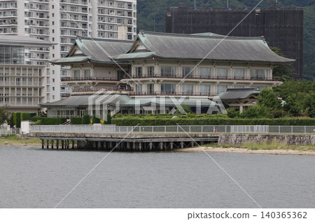 View of Lake Biwa Otsu Museum from a sightseeing boat. View of Lake Biwa Otsu Museum from a sightseeing boat. 140365362