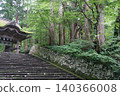 The approach to a shrine covered in greenery 140366008