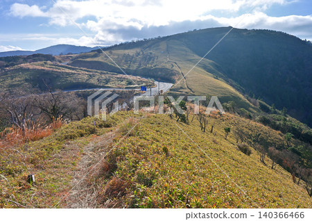 The Izu Ridge Trail on the Izu Peninsula offers a view of Kazehaya Pass and Nekogoe-dake, which are adjacent to the road. The Izu Ridge Trail on the Izu Peninsula offers a view of Kazehaya Pass and Nekogoe-dake, which are adjacent to the road. 140366466