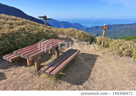 View of Suruga Bay from Kazehaya Pass along the road on the Izu Mountain Ridge Trail of the Izu Peninsula. View of Suruga Bay from Kazehaya Pass along the road on the Izu Mountain Ridge Trail of the Izu Peninsula. 140366471