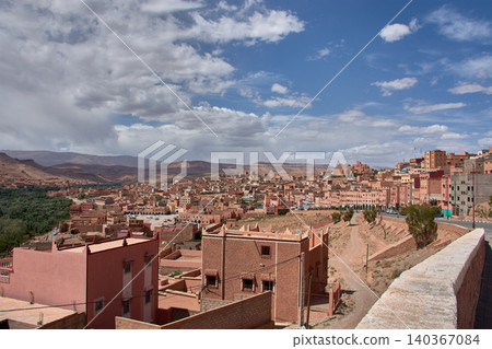 Panoramic view of the town of Boumalne Dades standing out against the desert plateau in Morocco Panoramic view of the town of Boumalne Dades standing out against the desert plateau in Morocco 140367084