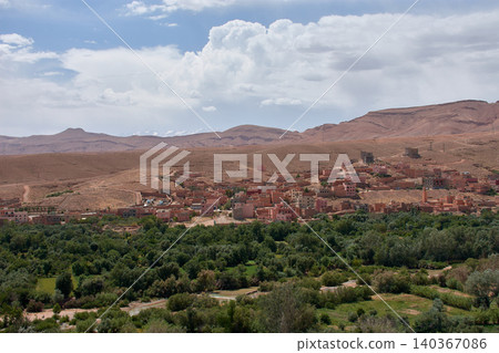 Panoramic view of the town of Boumalne Dades standing out against the desert plateau in Morocco Panoramic view of the town of Boumalne Dades standing out against the desert plateau in Morocco 140367086