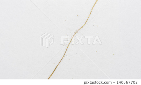 A modern Japanese material featuring extremely fine gold lines reminiscent of kintsugi (gold repair) running across pure white washi paper. A modern Japanese material featuring extremely fine gold lines reminiscent of kintsugi (gold repair) running across pure white washi paper. 140367702