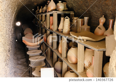 A landscape with a climbing kiln A landscape with a climbing kiln 140367726