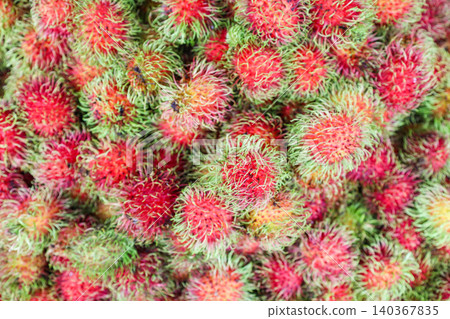 Rambutan sold in a Thai market Rambutan sold in a Thai market 140367835
