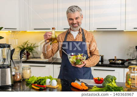 Middle-aged man presenting vegetable salad bowl in home kitchen for healthy diet meal prep guide pro Middle-aged man presenting vegetable salad bowl in home kitchen for healthy diet meal prep guide pro 140368967