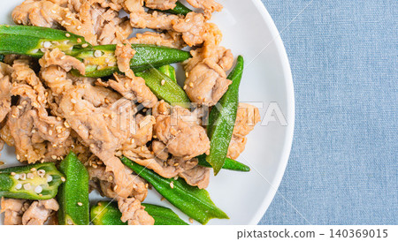 Stir-fried okra and pork, a Japanese-style dish with sesame flavor. Stir-fried okra and pork, a Japanese-style dish with sesame flavor. 140369015