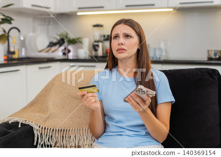 Young woman tries payment with smartphone and credit card gets insufficient funds card blocked fraud 140369154