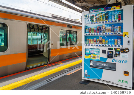 Tokyo - Vending machine for drinks - Takao Station platform 140369739