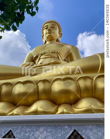 Golden Buddha statue at Wat Paknam temple in Thailand 140369838