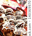 Delicious-looking takoyaki covered in plenty of sauce and mayonnaise. 140369970