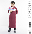 Smiling cute Asian boy in traditional Chinese clothing 140370164