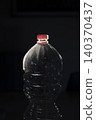 Plastic Water Bottle on Dark Background 140370437