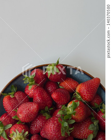 Fresh Strawberries in Ceramic Bowl White Background Overhead View Copy Space Fresh Strawberries in Ceramic Bowl White Background Overhead View Copy Space 140370580