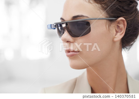 Augmented reality, face and businesswoman with smart glasses, internet connection and mockup in office. Future technology, workplace and happy girl with designer VR sunglasses, vision and electronics 140370581