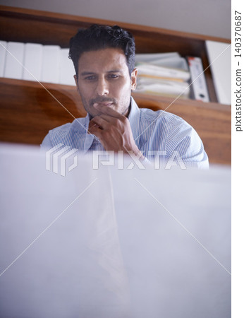 Thinking, idea and businessman reading on computer with mockup space, brainstorming or inspiration for salesman in office. Serious professional, decision and problem solving for solution or planning Thinking, idea and businessman reading on computer with mockup space, brainstorming or inspiration for salesman in office. Serious professional, decision and problem solving for solution or planning 140370687