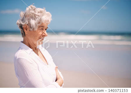 Elderly woman, smile and relax on beach for summer, happiness and peace in outdoors. Mature female person, retirement and enjoying on vacation journey, ocean and water for weekend or holiday Elderly woman, smile and relax on beach for summer, happiness and peace in outdoors. Mature female person, retirement and enjoying on vacation journey, ocean and water for weekend or holiday 140371153