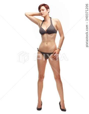Body, studio and confident woman in bikini, white background and self love for girl. Female person, underwear or swimwear for fashion, heels and aesthetic of model proud with outfit for bodycare Body, studio and confident woman in bikini, white background and self love for girl. Female person, underwear or swimwear for fashion, heels and aesthetic of model proud with outfit for bodycare 140371206