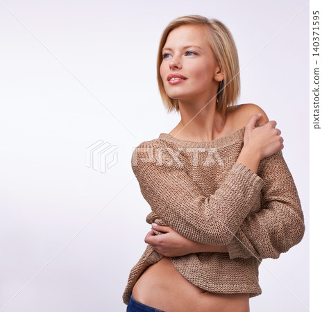 Studio, woman and skincare with jersey, glow and vision with happiness and satisfaction. Model, sweater and fashion for winter, care and treatment with comfort clothes or cardigan with style Studio, woman and skincare with jersey, glow and vision with happiness and satisfaction. Model, sweater and fashion for winter, care and treatment with comfort clothes or cardigan with style 140371595
