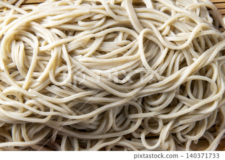 A close-up of cold soba noodles, conveying the texture of Japanese cuisine. 140371733