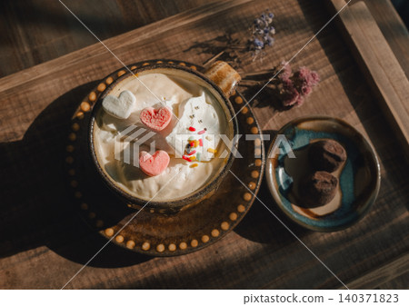 A heart-shaped coffee with a Valentine's Day theme from a stylish cafe. 140371823
