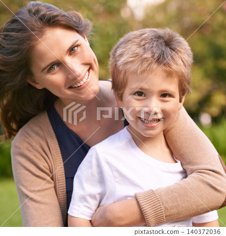Mother, son and hug with park, love and smile with portrait and together for happiness. Woman, child and nature with embrace, bonding and family with care and childhood for parenting in backyard Mother, son and hug with park, love and smile with portrait and together for happiness. Woman, child and nature with embrace, bonding and family with care and childhood for parenting in backyard 140372036