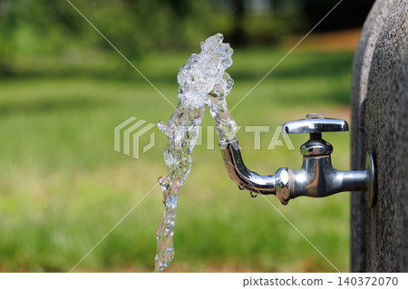 Water faucet in the park Water faucet in the park 140372070