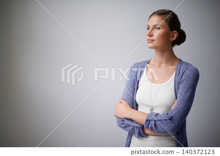 Space, designer or woman thinking in studio with arms crossed, creative plan or confidence. Brainstorming, employee or proud entrepreneur with vision or ideas or mockup isolated on grey background Space, designer or woman thinking in studio with arms crossed, creative plan or confidence. Brainstorming, employee or proud entrepreneur with vision or ideas or mockup isolated on grey background 140372123