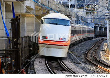 Tobu Limited Express "Ichigo Spacia" 100 series passing the "Isesaki Line, No. 2 Crossing" ahead of the elevation of the outbound line Tobu Limited Express "Ichigo Spacia" 100 series passing the "Isesaki Line, No. 2 Crossing" ahead of the elevation of the outbound line 140372671