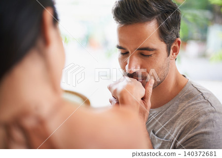 Man, woman and kiss hand for love at restaurant date for marriage commitment, anniversary or celebration. Happy couple, together and honeymoon in Italy for relationship care, connection or bonding 140372681